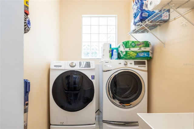 laundry area with washer and dryer