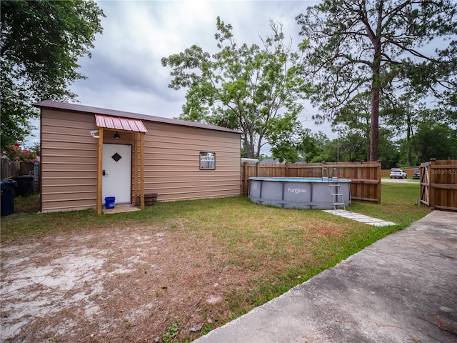 exterior space with a fenced in pool