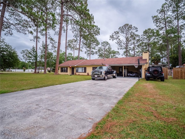 ranch-style home with a front yard