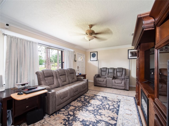 living room featuring visible vents, crown molding, light tile patterned floors, a textured ceiling, and a ceiling fan