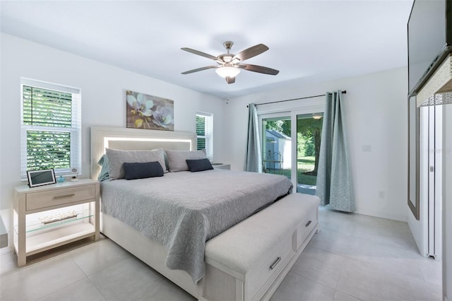 bedroom featuring access to outside, ceiling fan, and light tile patterned floors