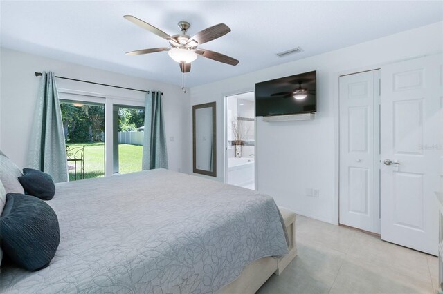 bedroom featuring visible vents, ceiling fan, ensuite bathroom, access to exterior, and light tile patterned flooring