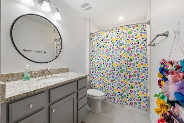 full bath featuring visible vents, toilet, tile patterned flooring, vanity, and a shower with curtain