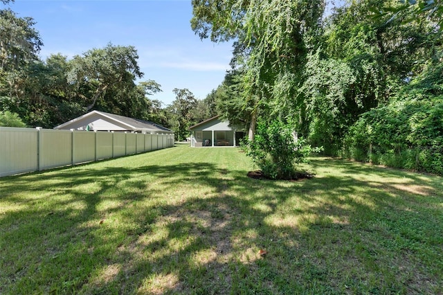 view of yard with fence