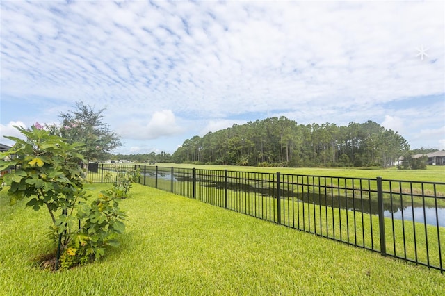 view of yard with a water view