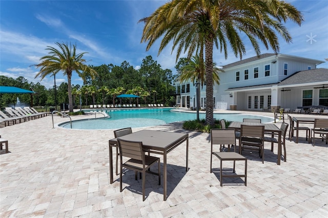 view of swimming pool featuring a patio