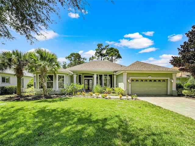 single story home with a front yard and a garage