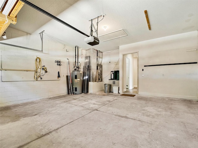 garage featuring a garage door opener and electric water heater