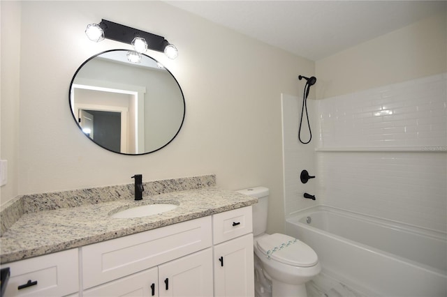 bathroom featuring toilet, shower / washtub combination, and vanity