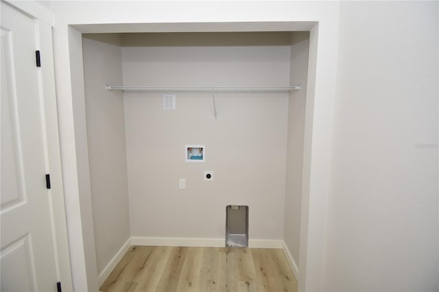 laundry room with hookup for a washing machine, laundry area, baseboards, light wood-style floors, and electric dryer hookup