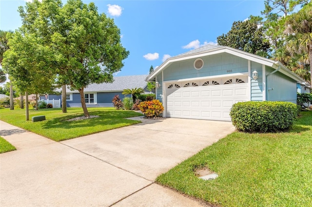 ranch-style house with a front yard and a garage