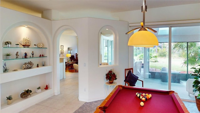 rec room with built in shelves, billiards, and light tile patterned floors