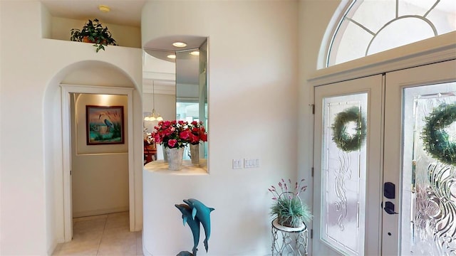 tiled entryway with french doors