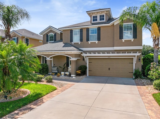 view of front of property featuring a garage