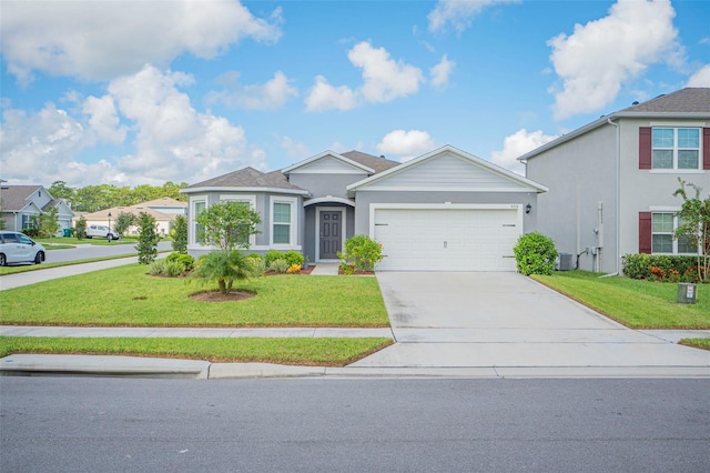 view of front of property featuring a garage, a front lawn, and cooling unit