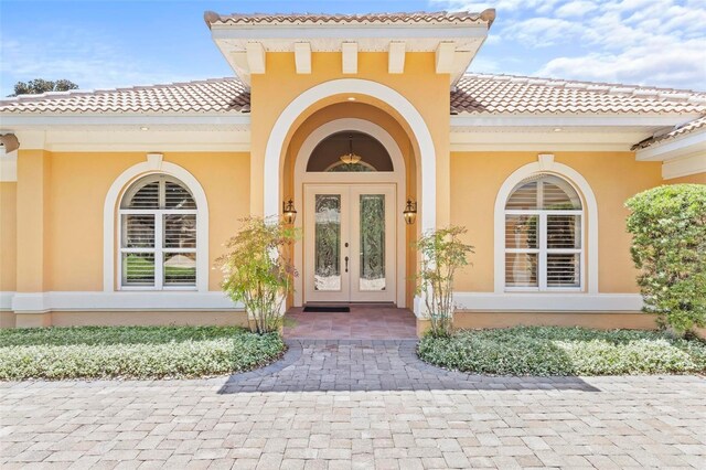 entrance to property featuring french doors