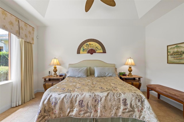 bedroom featuring ceiling fan and light tile patterned floors