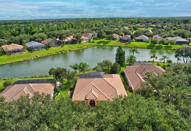 drone / aerial view with a water view