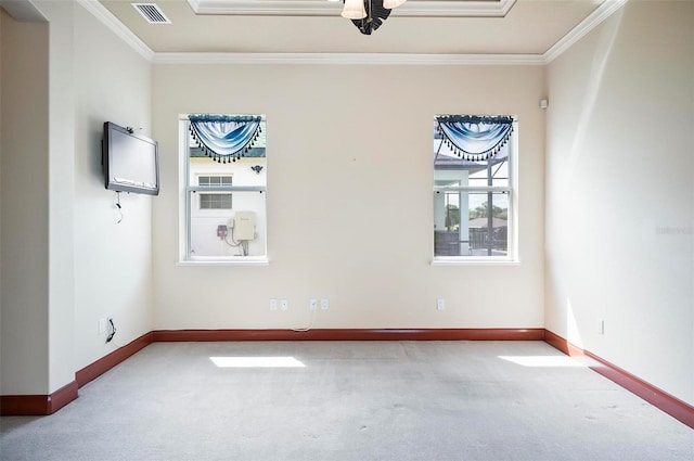 unfurnished room featuring crown molding and carpet