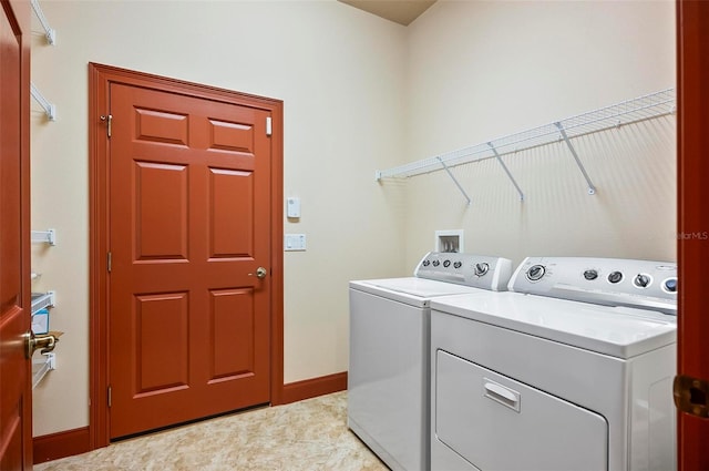 laundry room featuring independent washer and dryer