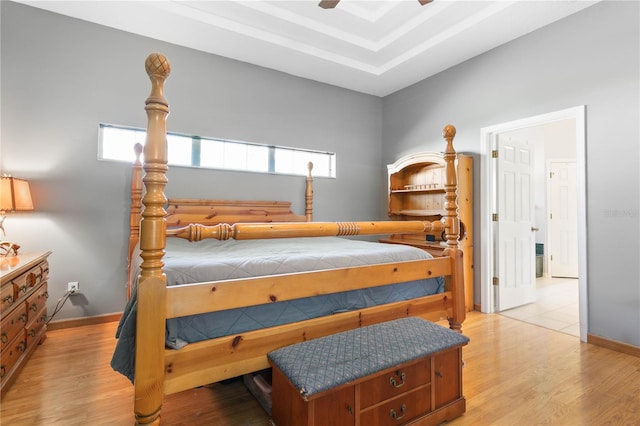 bedroom featuring ceiling fan and light hardwood / wood-style floors