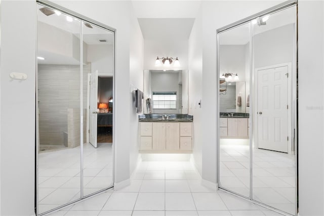 bathroom featuring tile patterned floors and vanity