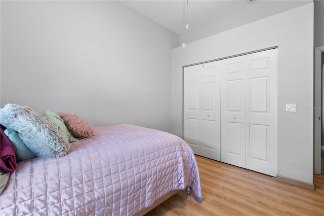 bedroom featuring a closet and light hardwood / wood-style floors