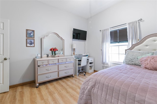 bedroom featuring light hardwood / wood-style floors