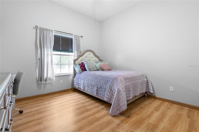 bedroom featuring light hardwood / wood-style flooring