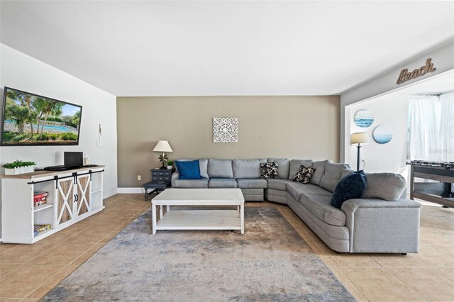 living room with light tile patterned floors