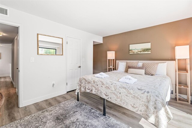 bedroom featuring light wood-type flooring