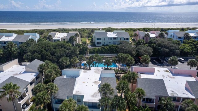 bird's eye view with a water view and a view of the beach