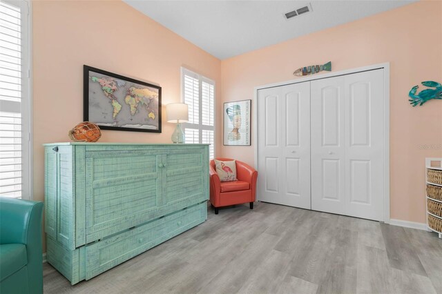 living area featuring light hardwood / wood-style floors