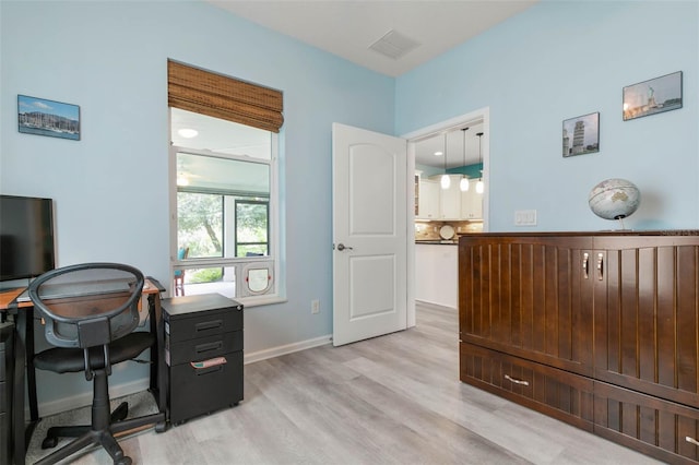 home office featuring light wood-type flooring