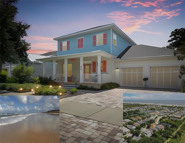 47 Sandy Bch, Way, Palm Coast, FL 32137 - view of front of home featuring a porch, a water view, concrete driveway, and a garage
