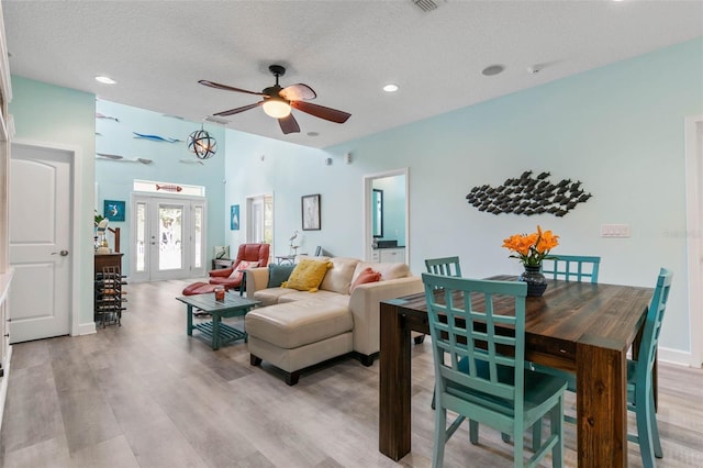 47 Sandy Bch, Way, Palm Coast, FL 32137 - living area with ceiling fan, light wood-style floors, a textured ceiling, recessed lighting, and baseboards