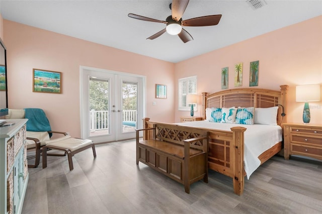 47 Sandy Bch, Way, Palm Coast, FL 32137 - bedroom with wood finished floors, access to outside, french doors, and a ceiling fan