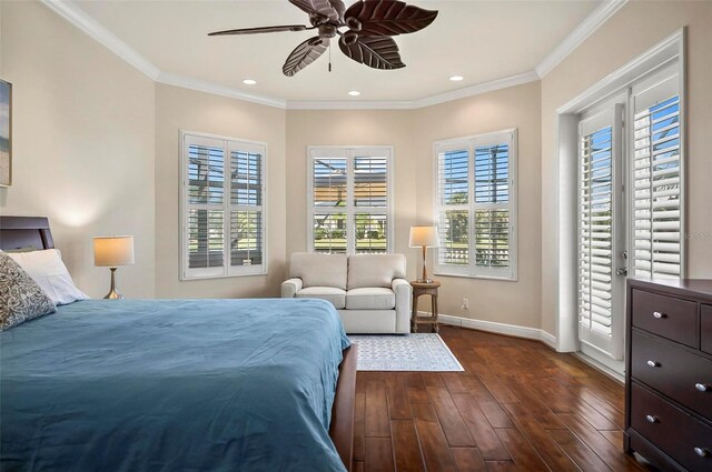 bedroom with crown molding, ceiling fan, and dark hardwood / wood-style floors