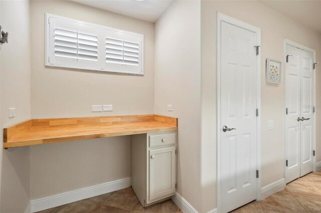 interior space with tile patterned flooring