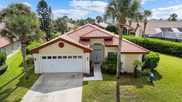 mediterranean / spanish-style house with a garage and a front lawn