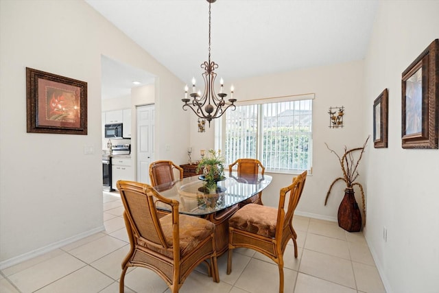 tiled dining room featuring a notable chandelier