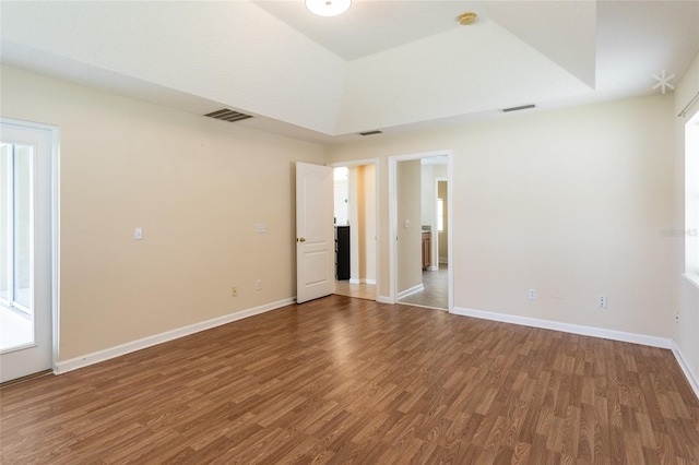 unfurnished bedroom with hardwood / wood-style flooring