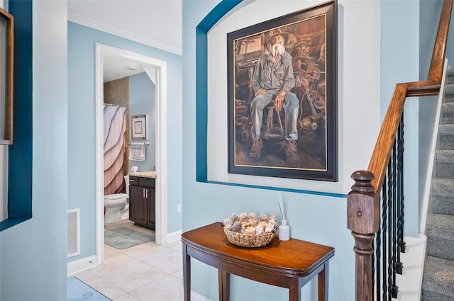 hallway featuring light tile patterned flooring