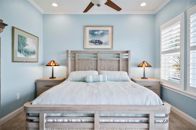 bedroom with crown molding, ceiling fan, and carpet floors