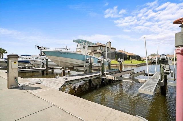 view of dock with a water view