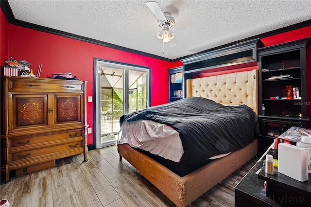 bedroom with ornamental molding, wood-type flooring, access to exterior, and ceiling fan