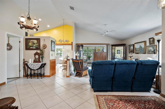 8 Sea Vista Dr, Palm Coast, FL 32137 - living area featuring a textured ceiling, baseboards, light tile patterned floors, ceiling fan with notable chandelier, and visible vents