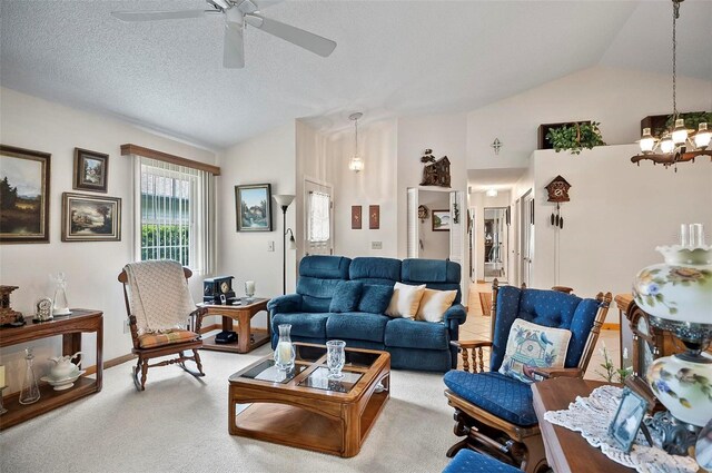 living room with lofted ceiling, light colored carpet, ceiling fan with notable chandelier, and a textured ceiling