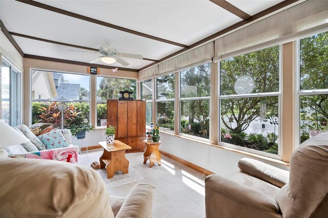 sunroom with ceiling fan