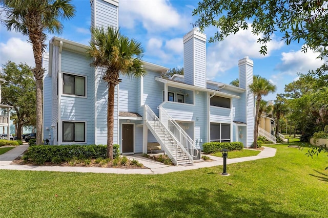 view of front of home with a front yard